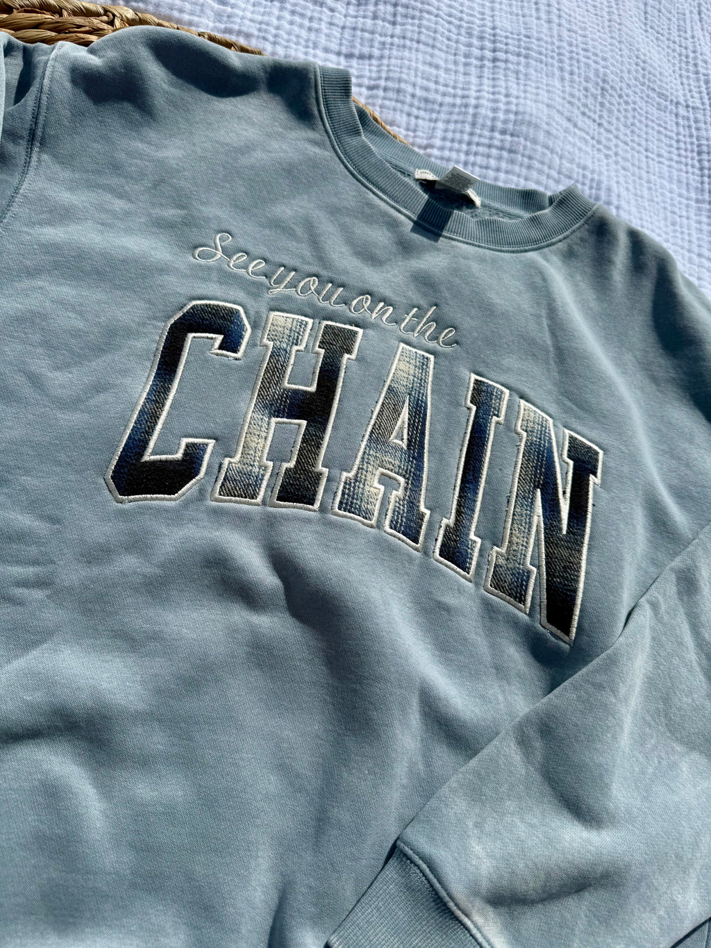 Flannel “see you on the chain” crewneck